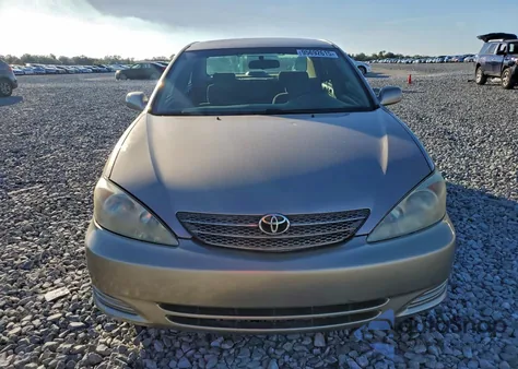 2002 Toyota Camry Le z USA, uszkodzony, nr VIN 4T1BE32K32U522526